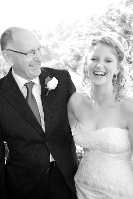 Bride laughing with her father - wedding photography sydney